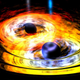 Illustration for article titled What Happens When Two Black Holes Collide?